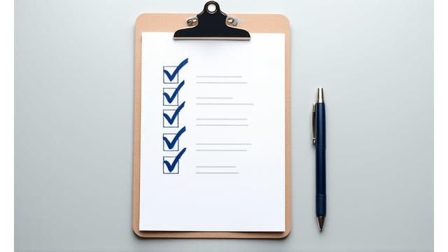 Checklist on a clipboard with a pen